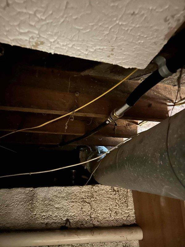Completed installation of new gas lines in attic space to supply HVAC equipment. Routed black iron pipe through ceiling joists and around existing ductwork, ensuring proper support and clearances per code requirements. Performed pressure test on all new gas piping to verify system integrity and absence of leaks before final connection to equipment.