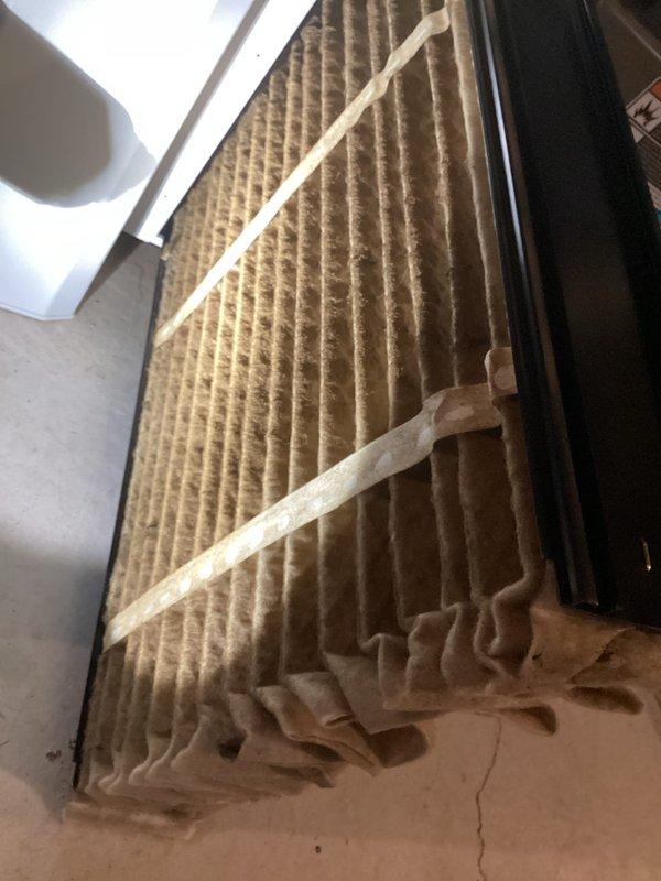 Performed planned maintenance on a Lennox natural gas furnace, completing a full diagnostic checklist covering safety inspection, electrical and motor evaluation (ECM blower, single-speed vent motor), ignition system, and gas system. Recorded line and low voltage, amp draw, flame sensor microamps, igniter resistance, pressure switch values, manifold pressure, and temperature rise, all within normal operating parameters. Found the air filter severely loaded with debris and deformed, and replaced it to restore proper airflow; the system was verified operational at final check-out.