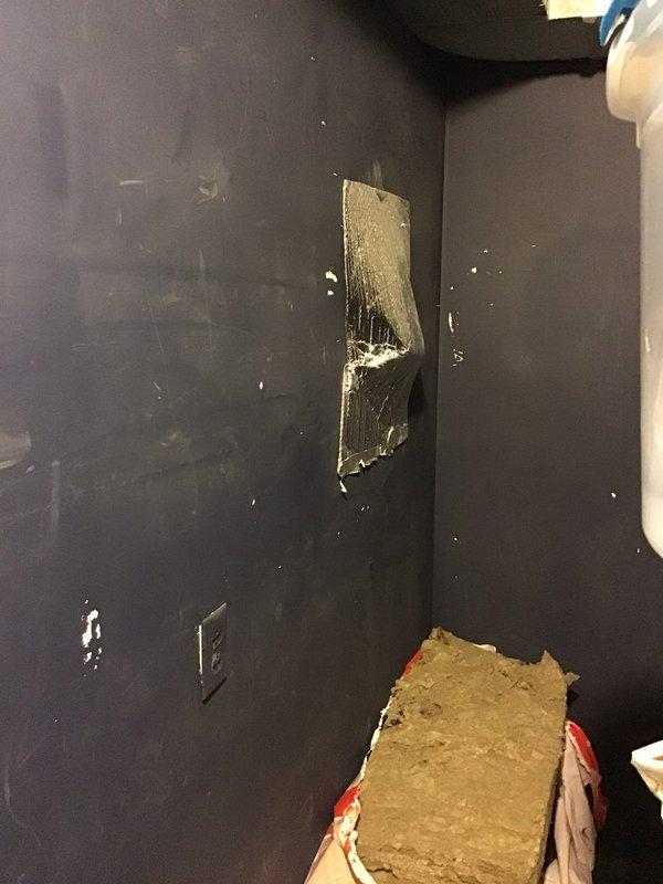 Conducted an on-site evaluation for an HRV (heat recovery ventilator) system installation and assessed the proposed mechanical space, a narrow utility closet with existing foil-faced insulation, mineral wool batting, PVC piping, ductwork, and an electrical outlet nearby. Documented existing conditions, including loose and damaged foil insulation and limited clearance from stored items, to determine equipment placement, ducting routes, and condensate drainage requirements for the proposed installation.