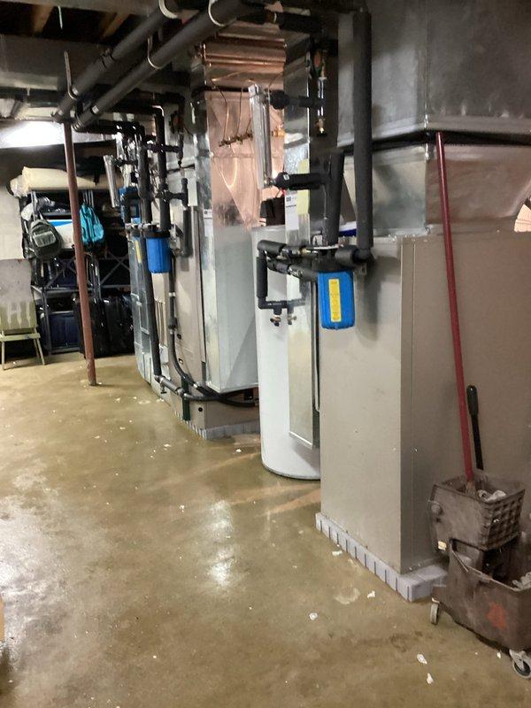Performed a planned maintenance visit on three geothermal heat pump systems, including a full system performance check and replacement of the in-line filters on all units. Replaced two sight glasses and completed a flush of the geothermal loop on all three systems to restore proper flow and heat transfer. Systems were left operating normally following service.