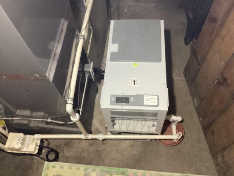 Performed an on-site assessment and estimate for installing a whole-house filtration system on the basement water supply line, positioned downstream of the water softener and upstream of the whole-house humidifier, to address mineral buildup clogging the humidifier supply. Evaluated the existing mechanical area, including the air handler, humidifier, condensate piping, and surrounding clearances, to confirm suitable placement and connection points for the filter assembly.