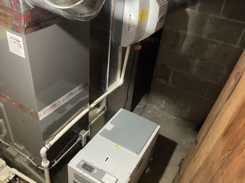 Performed an on-site assessment and estimate for installing a whole-house filtration system on the basement water supply line, positioned downstream of the water softener and upstream of the whole-house humidifier, to address mineral buildup clogging the humidifier supply. Evaluated the existing mechanical area, including the air handler, humidifier, condensate piping, and surrounding clearances, to confirm suitable placement and connection points for the filter assembly.