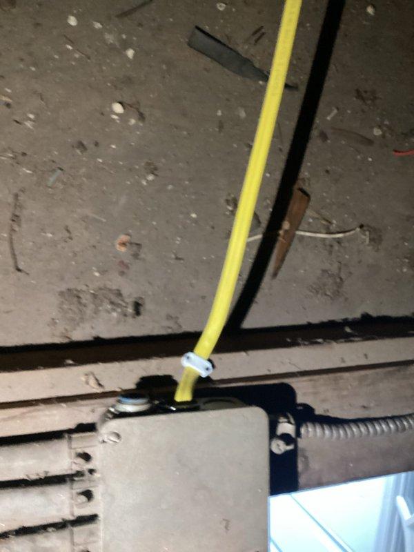 Responded to customer complaint of non-functional garage light fixture. Upon inspection, accessed ceiling area using ladder and identified loose connection in junction box. Secured wiring connections and verified proper operation of fixture. Confirmed all electrical components were safely installed according to code requirements.