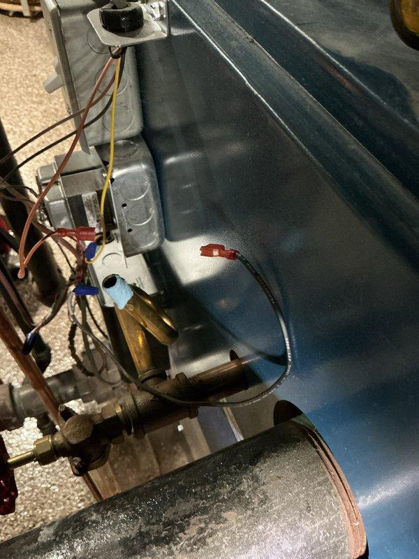 Performed routine maintenance service on two Dunkirk steam boilers located in basement. Inspected interior mechanical components including copper pipes, brass fittings, and electrical connections. All systems functioning properly with no issues identified during the maintenance visit.