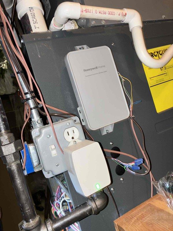 Performed routine maintenance on heating system with Honeywell control panel. Conducted electrical diagnostics using multimeter, measuring voltage readings of 0.195 and 0.034, confirming proper operation of control components. All connections and wiring were inspected and verified to be in satisfactory working condition.