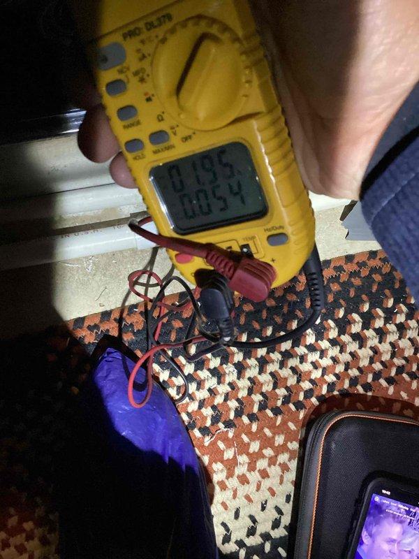 Performed routine maintenance on heating system with Honeywell control panel. Conducted electrical diagnostics using multimeter, measuring voltage readings of 0.195 and 0.034, confirming proper operation of control components. All connections and wiring were inspected and verified to be in satisfactory working condition.