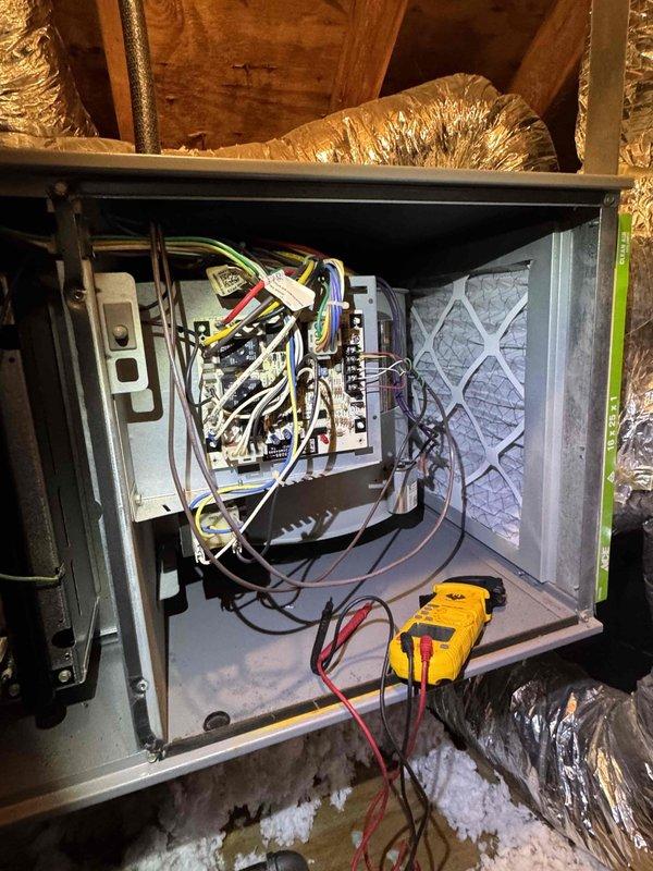 Responded to no heat complaint. Accessed attic-mounted furnace and performed diagnostic testing on electrical control panel with multimeter. Identified issue with control board/electrical components and restored system functionality. Customer's heating is now operational.
