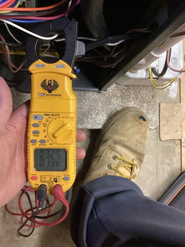 Performed comprehensive heating maintenance on two systems as part of recurring monthly service. Conducted electrical testing with clamp meter, measuring current draws (readings of 0.329 and 0.136 amps) to verify proper electrical operation. Inspected blower assembly, confirming secure mounting hardware and proper fan operation with no visible issues detected.