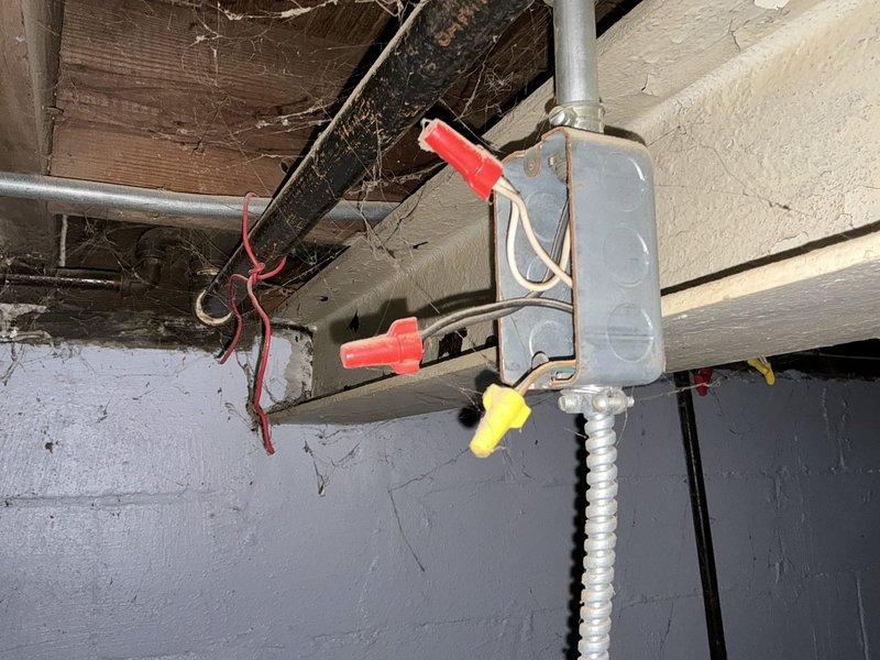 Conducted site assessment of existing electric baseboard heating system for potential replacement. Inspected electrical infrastructure including junction box connections and conduit routing in basement area. Customer requires complete estimate for replacement of current electric baseboard heating unit.