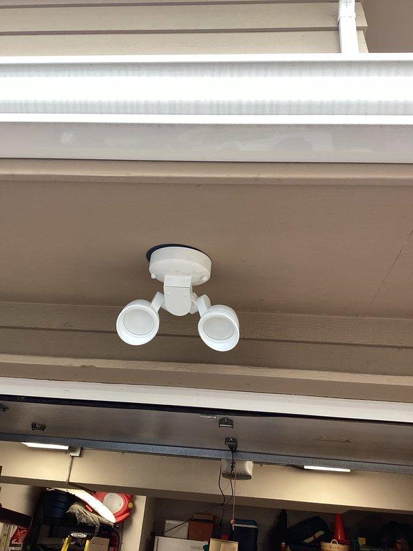 Assessed customer request for new outlet installation to power furnace humidifier. Inspected existing electrical infrastructure including ceiling-mounted security lighting and GFCI receptacle in weatherproof junction box. Evaluated optimal placement for new outlet and documented requirements for proper installation according to code.