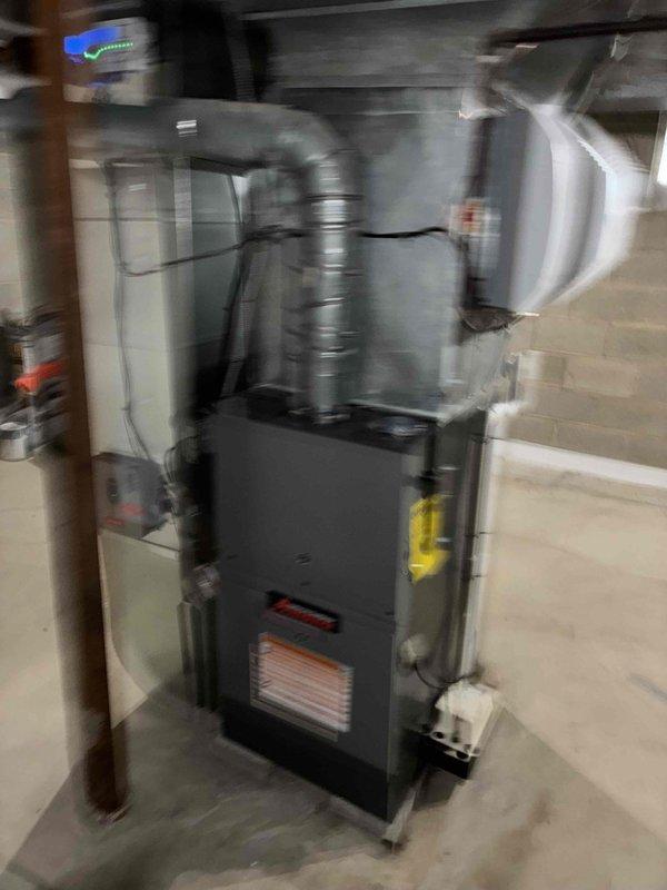 Installed new 80% efficiency furnace with integrated humidifier and condensate pump. System was properly connected to existing ductwork and secured in utility room. Noted significant corrosion on copper supply plumbing that may require attention in the future.