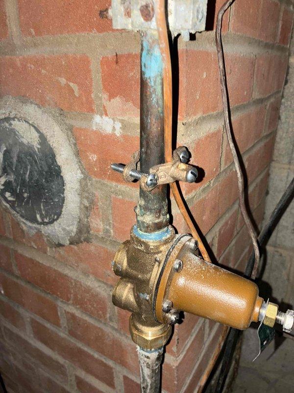 Installed new 80% efficiency furnace with integrated humidifier and condensate pump. System was properly connected to existing ductwork and secured in utility room. Noted significant corrosion on copper supply plumbing that may require attention in the future.