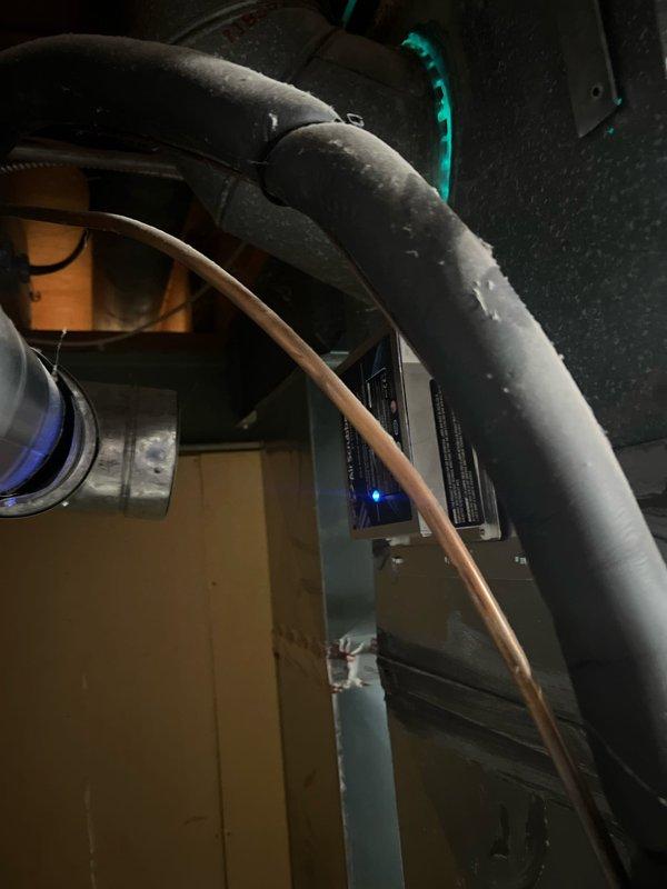 Successfully installed AprilAire 600 bypass humidifier and air scrubber as scheduled. Mounted humidifier unit with digital humidity control panel featuring LED display and adjustment capabilities. All components properly connected to existing ductwork with secure fittings and appropriate drainage lines in place.