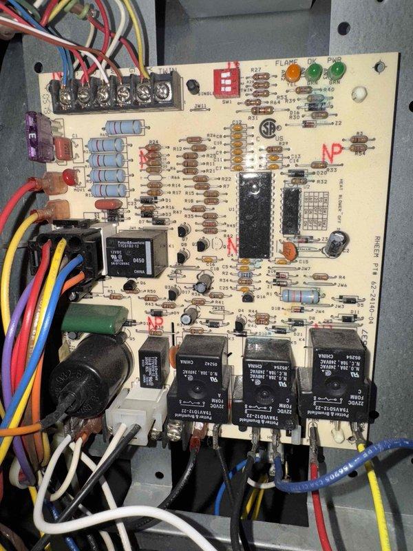 Performed scheduled monthly maintenance on dual heating systems. Inspected electrical components including the 60-amp circuit breaker and main control board, confirming proper connections and operation. All diagnostic LEDs on control module functioning normally with no faults detected.