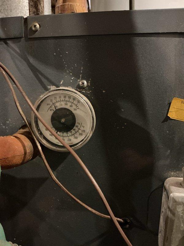 Performed routine maintenance on the residential boiler system, checking operating pressure on the gauge which showed normal readings. Inspected water heater and ventilation components, confirming proper functioning of all connections. System is operating within normal parameters with no issues requiring further attention.