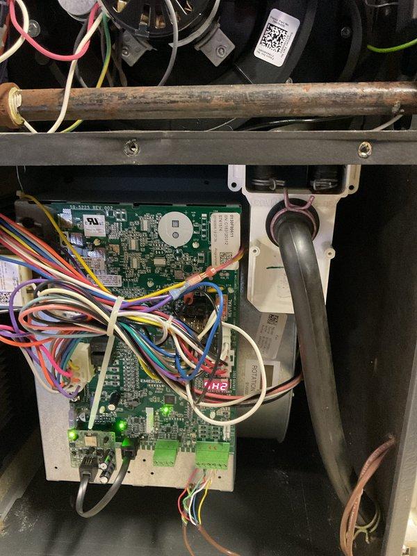 Performed routine furnace maintenance service including inspection of burner assembly and flame pattern. Checked control board functionality and all electrical connections. System is operating correctly with proper combustion indicated by blue flames at the burners. All components and wiring harness in good working condition.