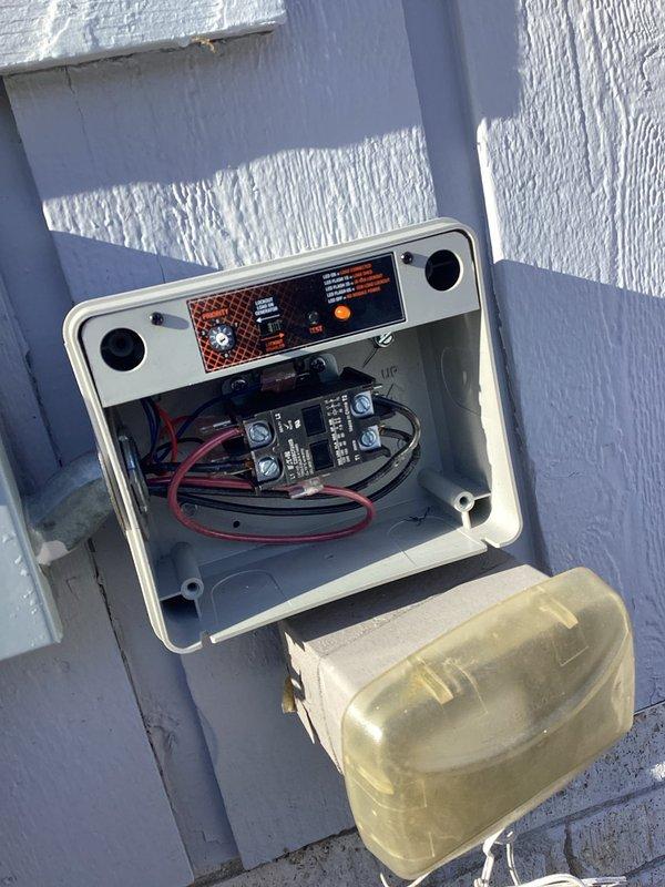 Successfully replaced a faulty 50 amp load shed module on a Generac generator system. The installation involved removing the old weathered load shed device and installing the new Generac component, ensuring proper connection to the existing Mars control box. All wiring was properly terminated and the system was tested to verify proper load shedding functionality.