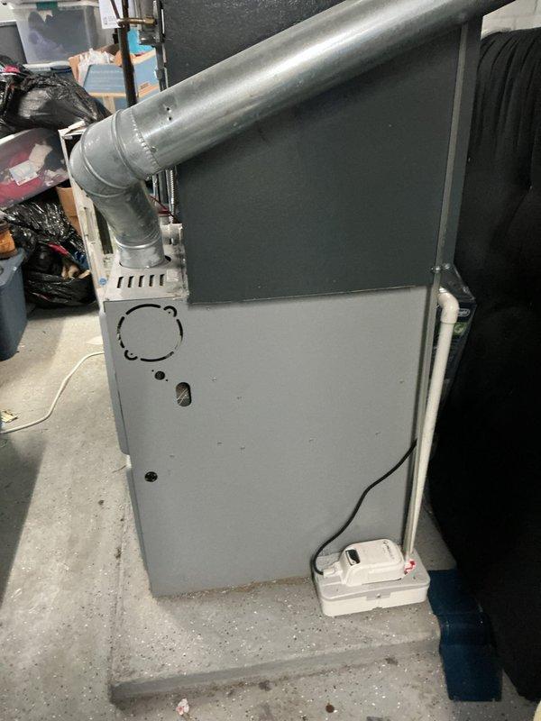 Responded to emergency no-heat service call for 10+ year old system. Conducted pressure testing with manometer (reading 0.11) on the Honeywell pressure switch assembly. Diagnosed and restored proper function to furnace system, returning heat to entire home which had dropped to 63°F.