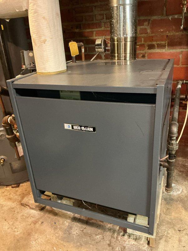 Performed scheduled contract maintenance on Weil-McLain boiler. Inspected valves, copper lines, and flue system. System found in standard working condition with all connections secure and properly functioning.