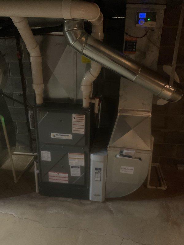 Performed maintenance on two heating furnace systems. Inspected exterior and interior components including electrical wiring, blower assemblies, and ventilation pipes. All systems functioning properly with no issues identified.