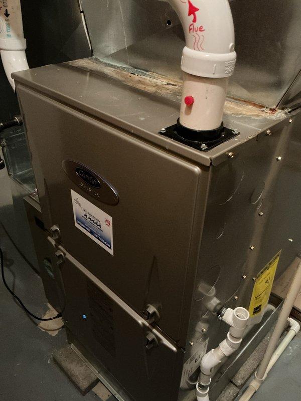 Performed monthly heating maintenance on Carrier furnace system. Inspected and cleaned interior components including circuit board, wiring connections, and heat exchanger. Checked PVC flue piping and condensate drain connections for proper function and integrity.