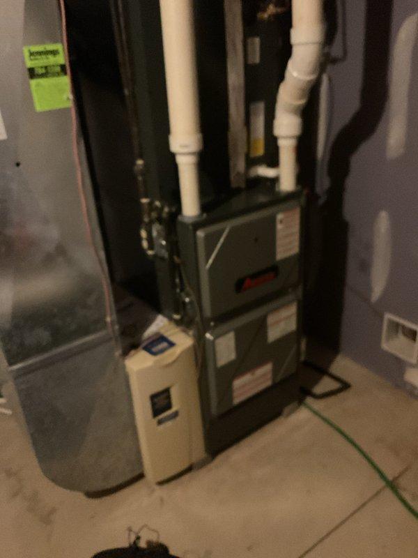 Performed monthly heating maintenance service on residential HVAC system. Inspected furnace installation including venting, humidifier attachment, and electrical components. Control board and wiring connections were examined and verified to be in proper working condition.