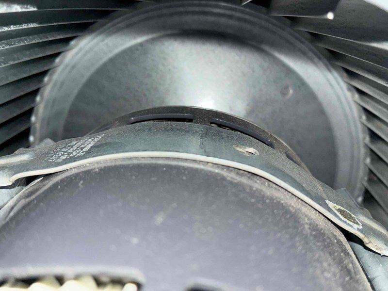 Performed routine heating maintenance service on unit. Inspected blower wheel assembly for proper operation, noting minor dust accumulation but overall good condition. Checked mechanical components and ductwork connections for integrity and functionality. System operational after service.