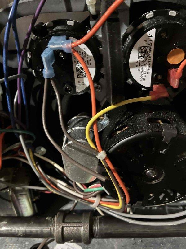 Performed scheduled monthly heating maintenance service on HVAC system. Inspected internal motor components, wiring connections, and QR-coded components for proper operation. Examined plumbing connections including elbow joints and couplings for leaks and integrity, ensuring all components are functioning correctly for optimal heating performance.
