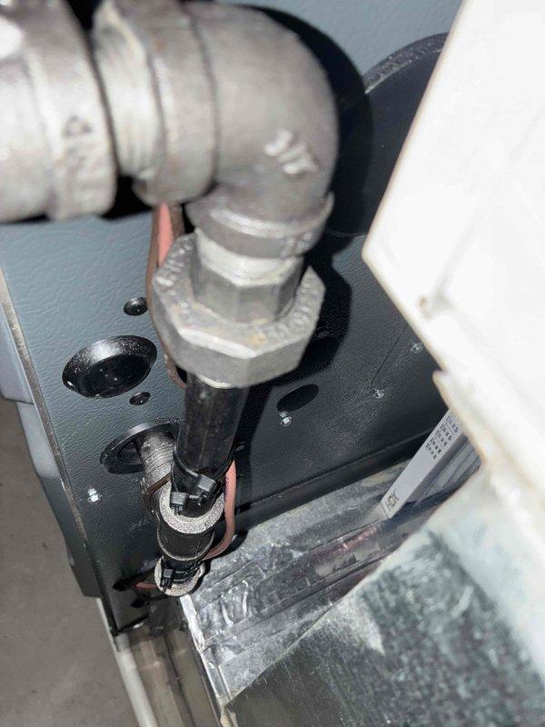 Performed scheduled monthly heating maintenance service on HVAC system. Inspected internal motor components, wiring connections, and QR-coded components for proper operation. Examined plumbing connections including elbow joints and couplings for leaks and integrity, ensuring all components are functioning correctly for optimal heating performance.