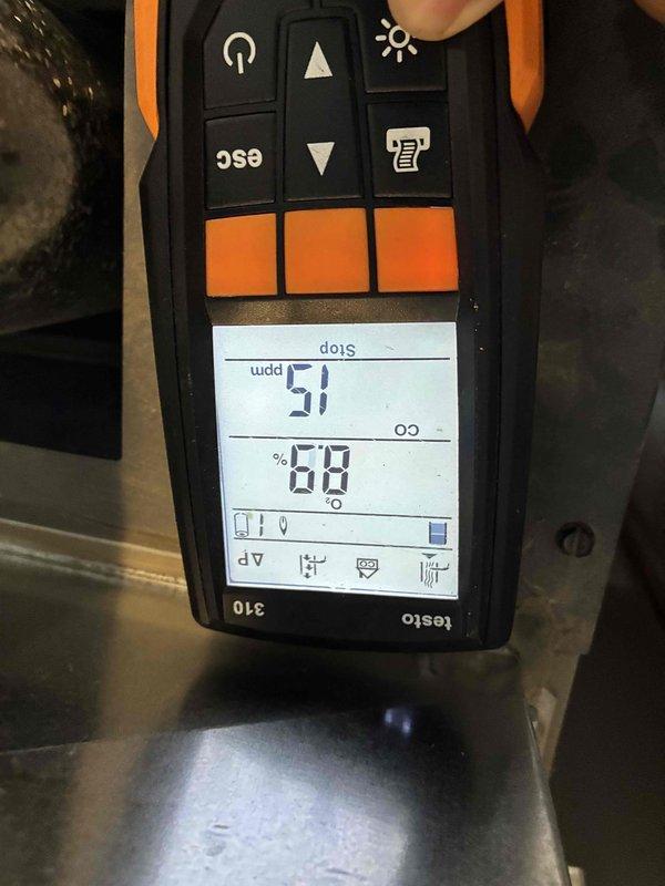 Performed comprehensive heating system tune-up including combustion analysis with Testo 310 analyzer, which measured CO levels at 51 ppm and efficiency at 68%. Inspected and cleaned blower wheel assembly to remove accumulated dust and debris, improving system airflow and operational efficiency.