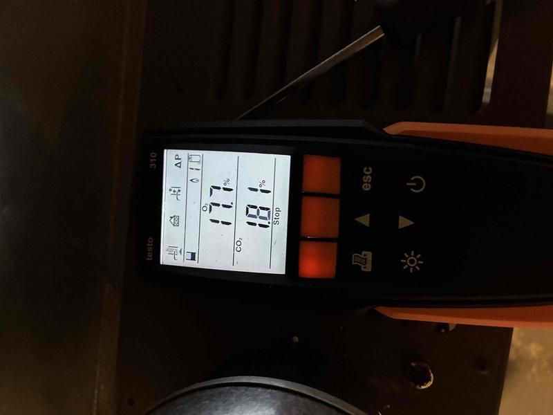 Performed routine winter maintenance tune-up on HVAC heating system. Conducted comprehensive diagnostic testing with digital measurement tool (e9C model), recording temperature readings of 17.1° and 19.1°. Inspected electrical connections and motor assembly, confirming proper wire connections and functionality of the fan component.