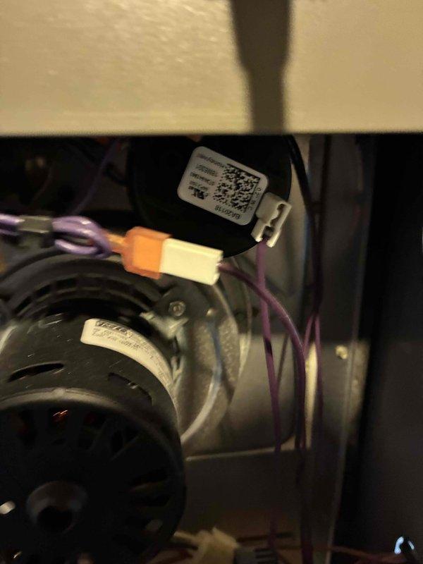 Performed routine winter maintenance tune-up on HVAC heating system. Conducted comprehensive diagnostic testing with digital measurement tool (e9C model), recording temperature readings of 17.1° and 19.1°. Inspected electrical connections and motor assembly, confirming proper wire connections and functionality of the fan component.