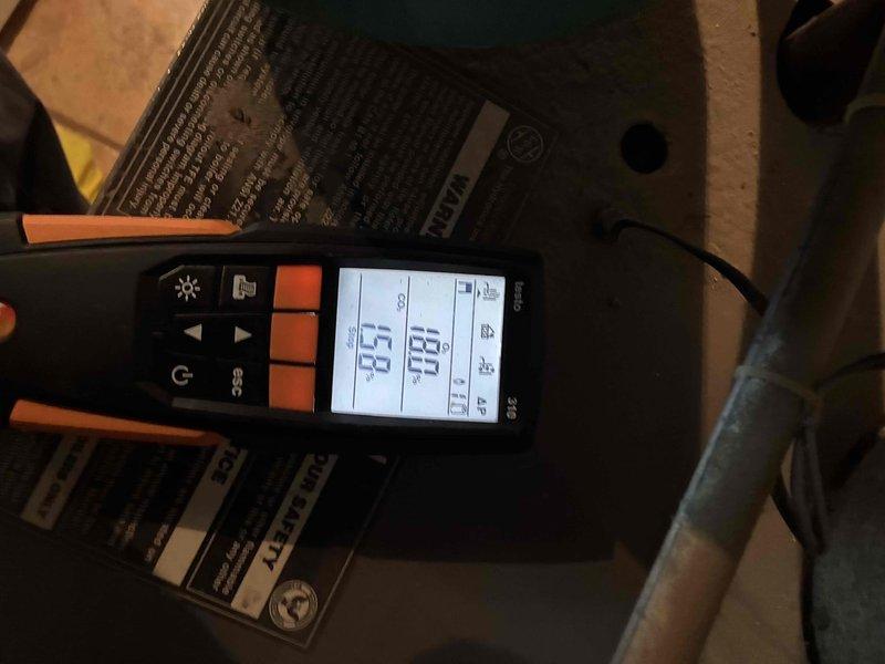 Performed routine heating maintenance on dual system setup. Inspected blower assembly components including motor, wheel, and electrical connections. Conducted diagnostic measurements with digital analyzer showing system operating within parameters (35/88 readings).