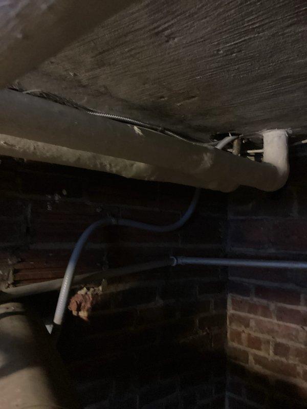 Completed installation of a sub-panel with proper circuit balancing. Installation included routing flexible metallic conduit through crawlspace/basement area and coordinating around existing plumbing infrastructure. Ensured all electrical connections were secure and code-compliant.