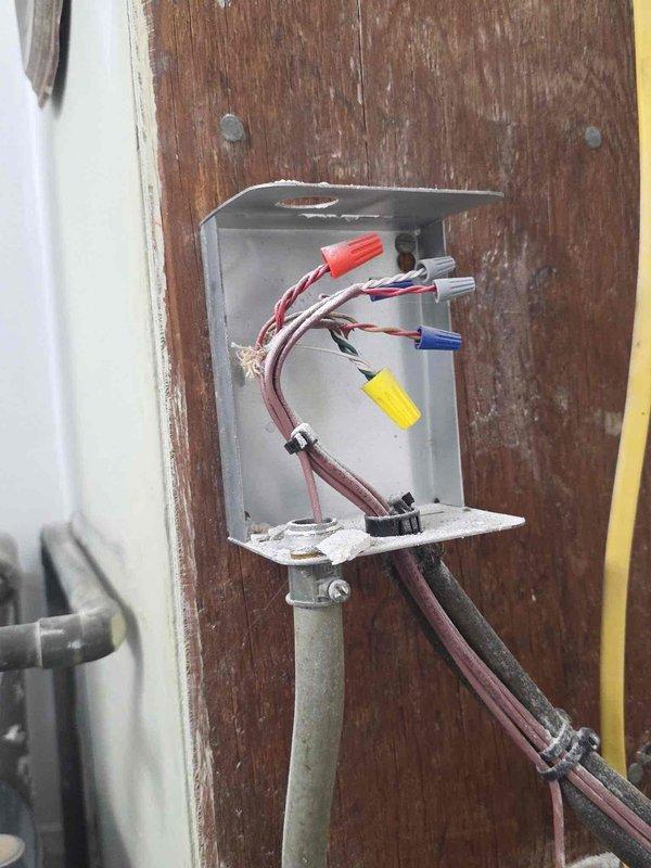Diagnosed thermostat communication issue with boiler system. Inspected electrical junction box and internal relay connections, identifying faulty wiring at the thermostat control interface. Repaired electrical connections to restore proper communication between thermostat and boiler.