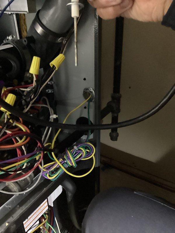 Performed routine heating maintenance service on residential HVAC system. Conducted electrical component inspection, checking wire connections and terminals for proper installation. Measured system pressure (1030) and temperature (66) readings, confirming unit is operating within normal parameters.