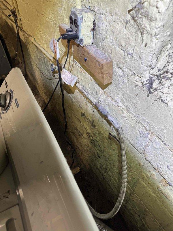 Performed routine maintenance on 20-year-old steam boiler system as part of scheduled biannual service agreement. Inspected aging pipe infrastructure showing signs of corrosion and identified moisture damage with possible mold growth on wall near electrical connections. Recommended addressing deteriorating wall conditions and proper securing of electrical components to prevent safety hazards.