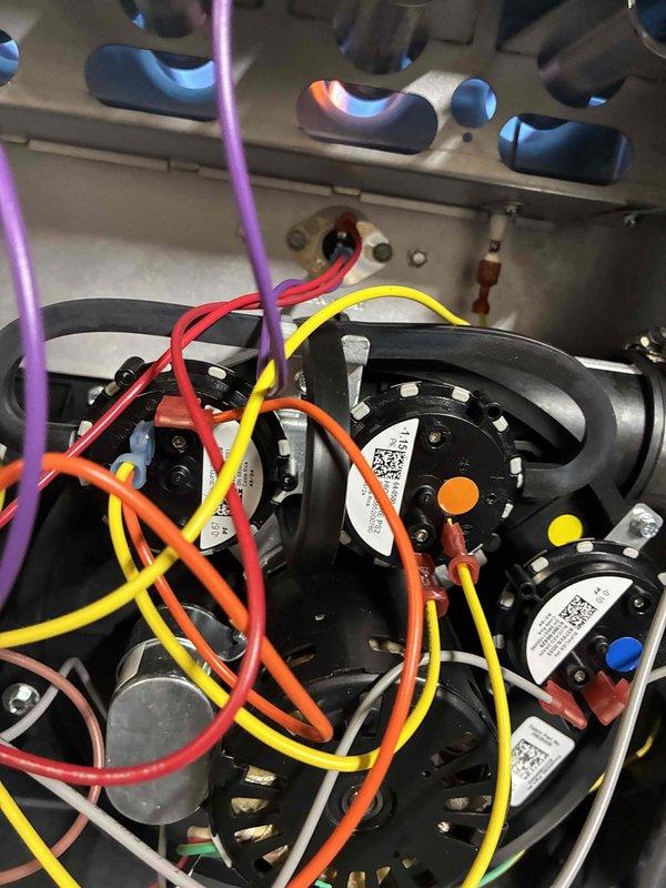 Performed scheduled annual maintenance on Amana furnace system. Inspected electrical components including pressure switches, sensors and wiring connections to ensure proper functionality and safety. Also serviced hot water heater as requested by customer during the maintenance visit.
