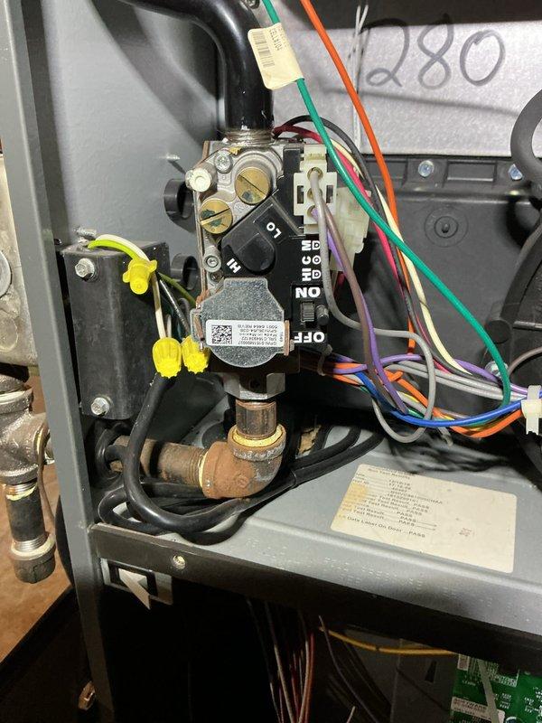 Performed scheduled heating maintenance service on customer's furnace. Conducted gas valve inspection and verified proper operation with readings of 34.7 on manometer test. Completed hot water tank flush and fill procedure as part of comprehensive system maintenance.