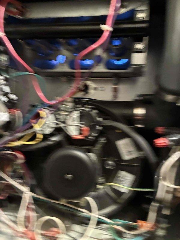 Performed scheduled maintenance on heating system 1. Inspected electrical components including control board, motor assembly, and wiring connections. Verified proper function of fan motor and electrical relay system with all connections secure and operational.