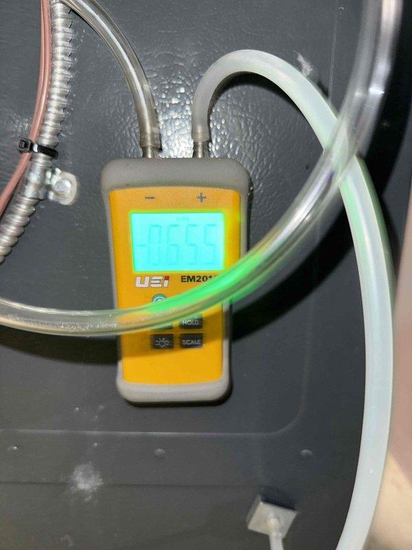 Performed scheduled monthly heating maintenance on two systems. Conducted temperature testing at supply registers with readings of 45°F. Measured static pressure of 0.55" WC using UEi EM201 meter. Both systems operating within normal parameters.