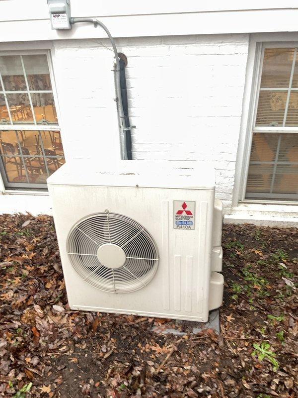 Responded to follow-up service call for Mitsubishi mini-split system not cooling. Performed diagnostic inspection of both indoor wall-mounted evaporator unit and outdoor condenser. System was restored to proper cooling operation after clearing debris from outdoor unit and reestablishing proper refrigerant pressures.