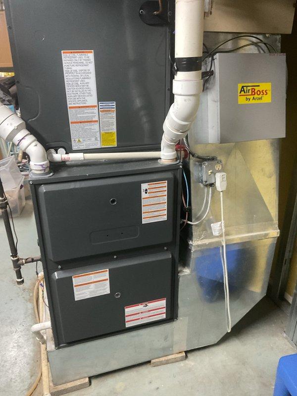 Performed routine heating maintenance on residential furnace system. Inspected blower motor, electrical connections, PVC ventilation components, and Airboss zone control system. All components found to be functioning normally with no issues requiring correction.