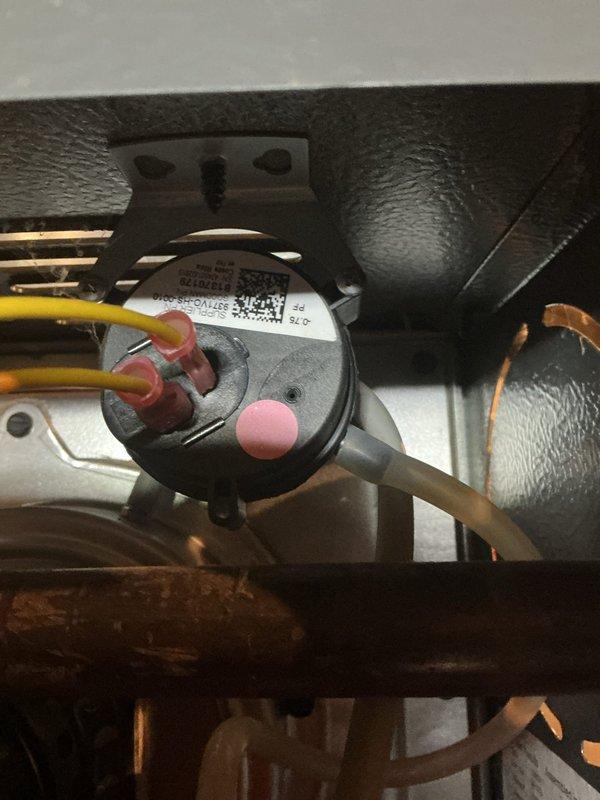 Responded to no heat call where system was cycling and blowing cold air. Diagnosed faulty pressure switch as evidenced by 0.38 reading on differential thermometer. Replaced defective pressure switch to restore proper system operation and heating functionality.