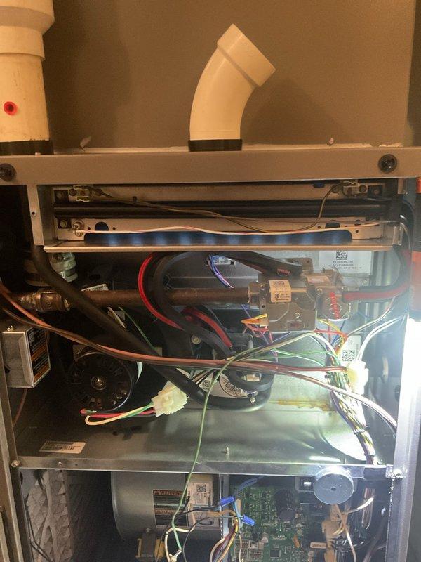 Performed scheduled monthly heating maintenance on furnace system. Inspected interior components including blower motor, circuit board, and electrical connections, all found to be in proper working order. Examined condensate drain system and ductwork connections, confirming proper installation with no visible issues.