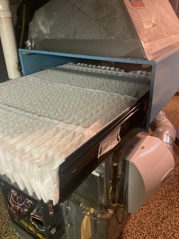 Completed routine heating maintenance service on gas furnace. Inspected burner flames for proper operation and verified all electrical connections are secure. Examined air filter which was found in acceptable condition with no replacement needed at this time.