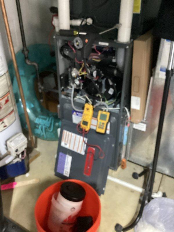 Performed comprehensive heating system maintenance on furnace installed in 2023. Conducted pressure/airflow measurements using USI EM152 device, obtaining readings of 4.23. Accessed electrical compartment for thorough inspection and diagnostics of wiring and connections using multimeters to verify proper electrical function of the system. All components tested within normal operating parameters per manufacturer specifications.