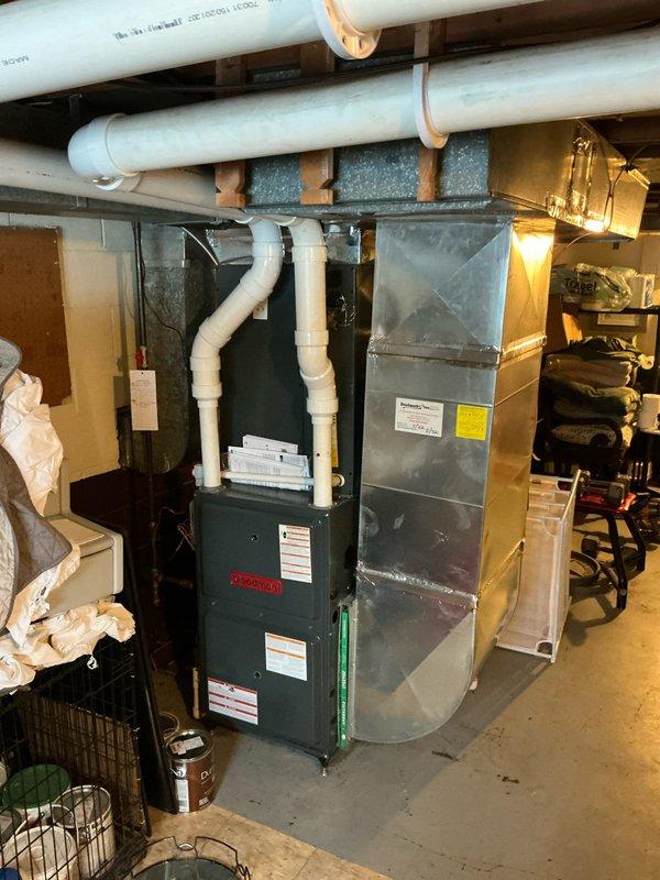 Conducted consultation with customer Tony regarding HVAC zoning options. Inspected existing basement setup which includes a furnace with attached ductwork system, PVC ventilation pipes, and evaluated current airflow distribution. Documented current system configuration and basement layout to develop appropriate zoning recommendations.