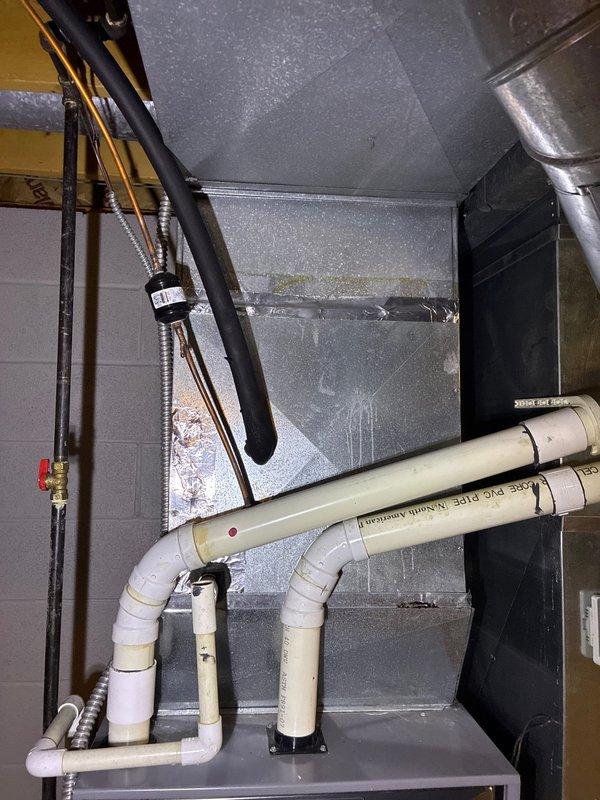 Completed comprehensive assessment of existing HVAC system and water heater in basement location. Evaluated furnace replacement options and presented customer with both standalone furnace solutions and complete system replacement alternatives. Documented current installation configuration, including PVC drainage system, ductwork condition, and existing mechanical room layout for proper equipment sizing and installation planning.