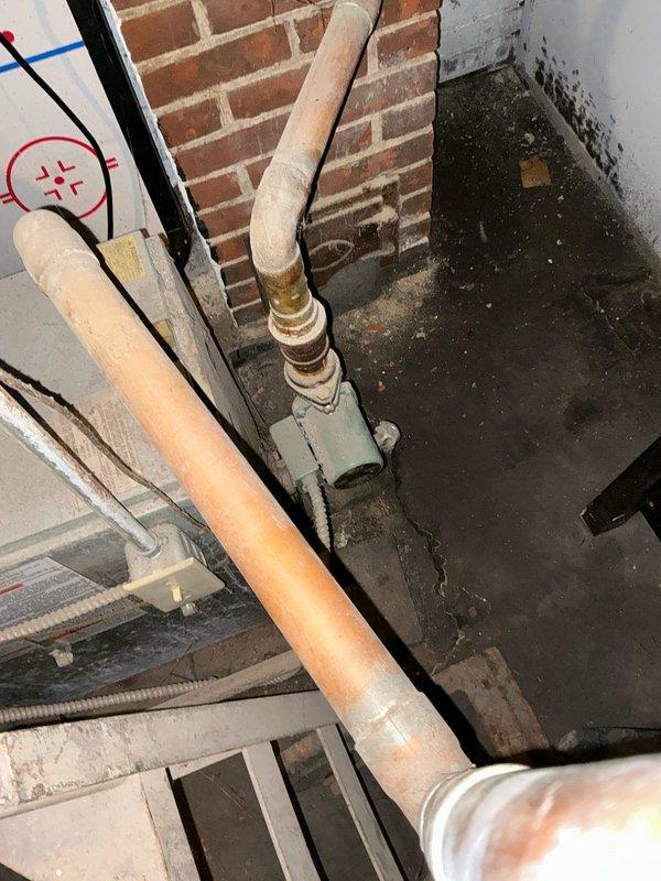 Conducted assessment of existing heating system, including examination of aged cast iron radiators and basement plumbing infrastructure. Presented client with replacement options for boiler system, radiator units, and hot water tank to address outdated equipment. Documented current installation with photographs for reference in preparing comprehensive upgrade proposal.